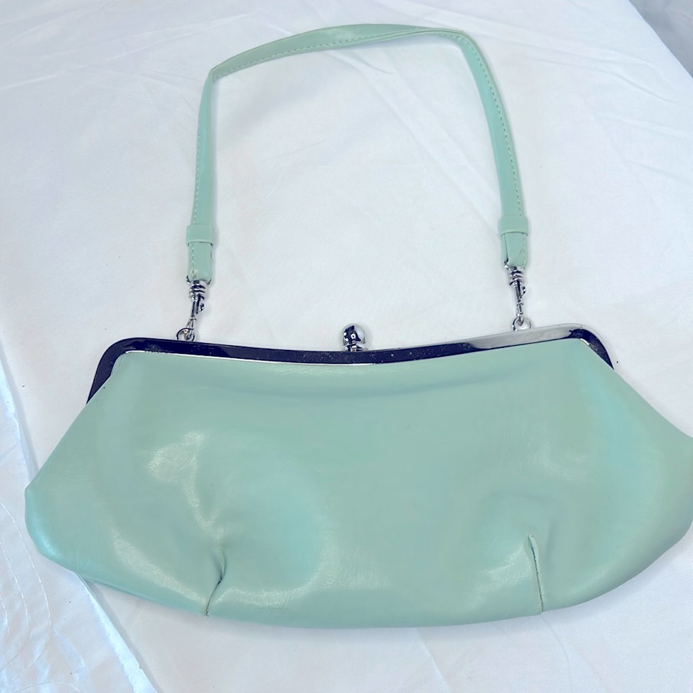 Seafoam colored vintage style handbag. Detachable straps.